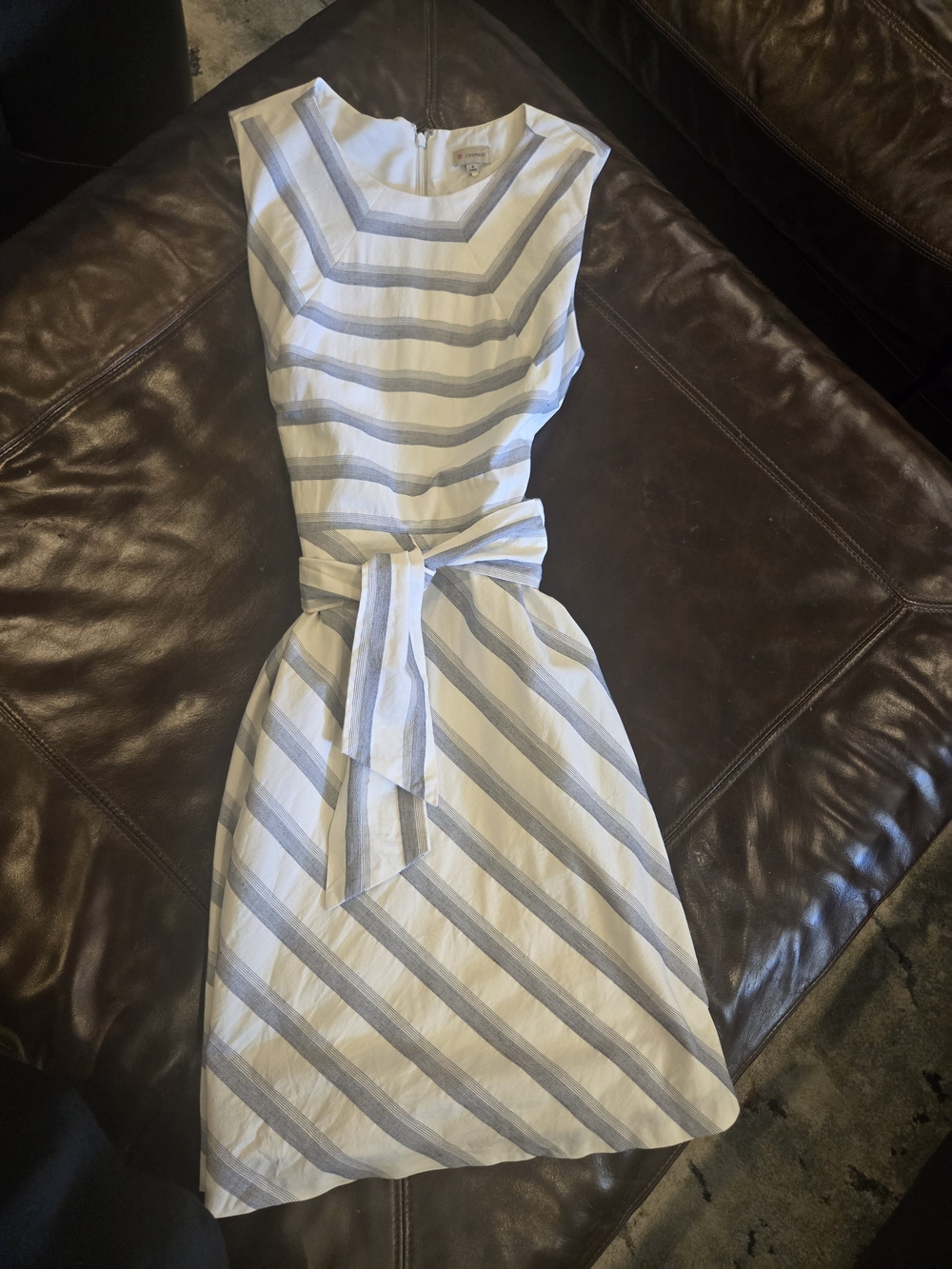 Sleeveless White and Light Blue Striped Tie-Waist Dress